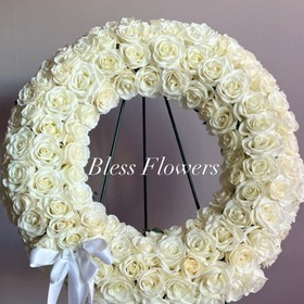 Unique funeral wreath with white roses
